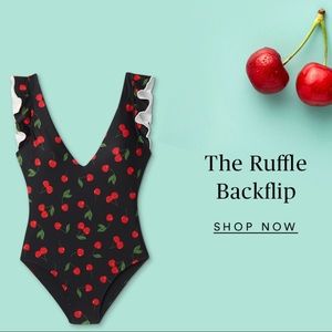 Summersalt Ruffle Backflip one-piece, black with cherry print, size 10